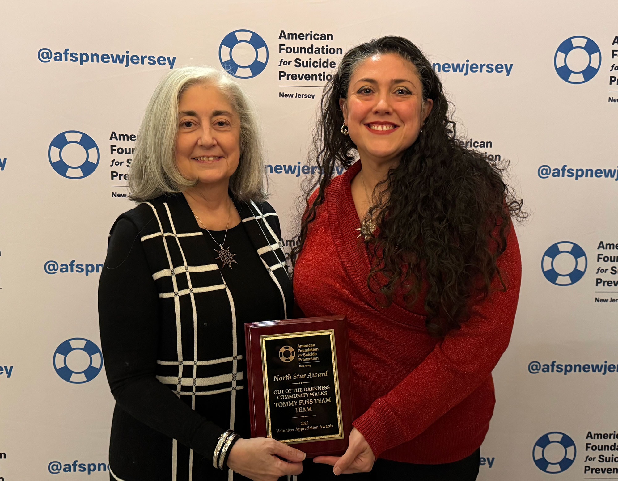Valerie and Kristin receiving the North Star Award