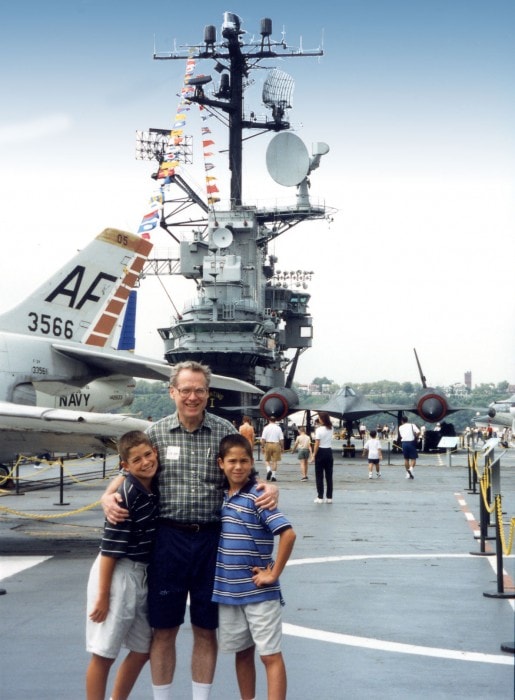 Tommy, Dan, and their father on the deck of the Intrepid, 1997