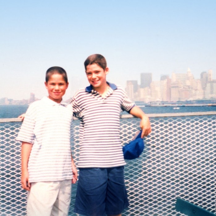 Tommy and Dan on the Staten Island Ferry with the Manhattan skyline, 1999