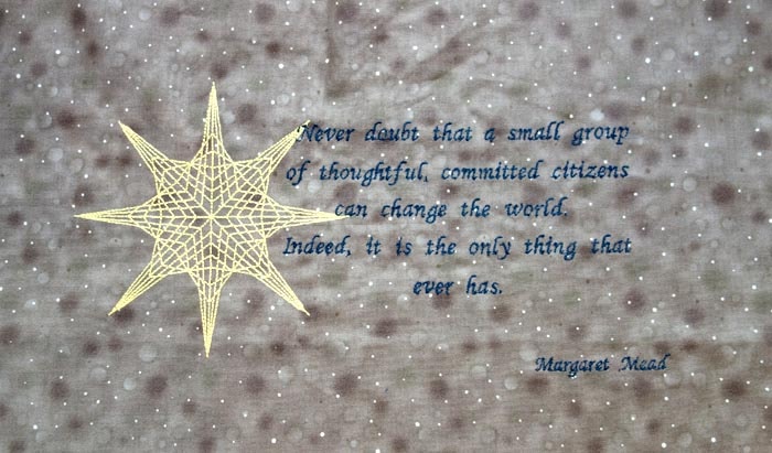 Margaret Mead quote embroidered artwork: Never doubt that a small group of thoughtful, committed citizens can change the world